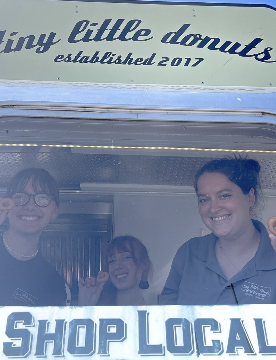 polaroid picture of tiny little donuts founders on an RV