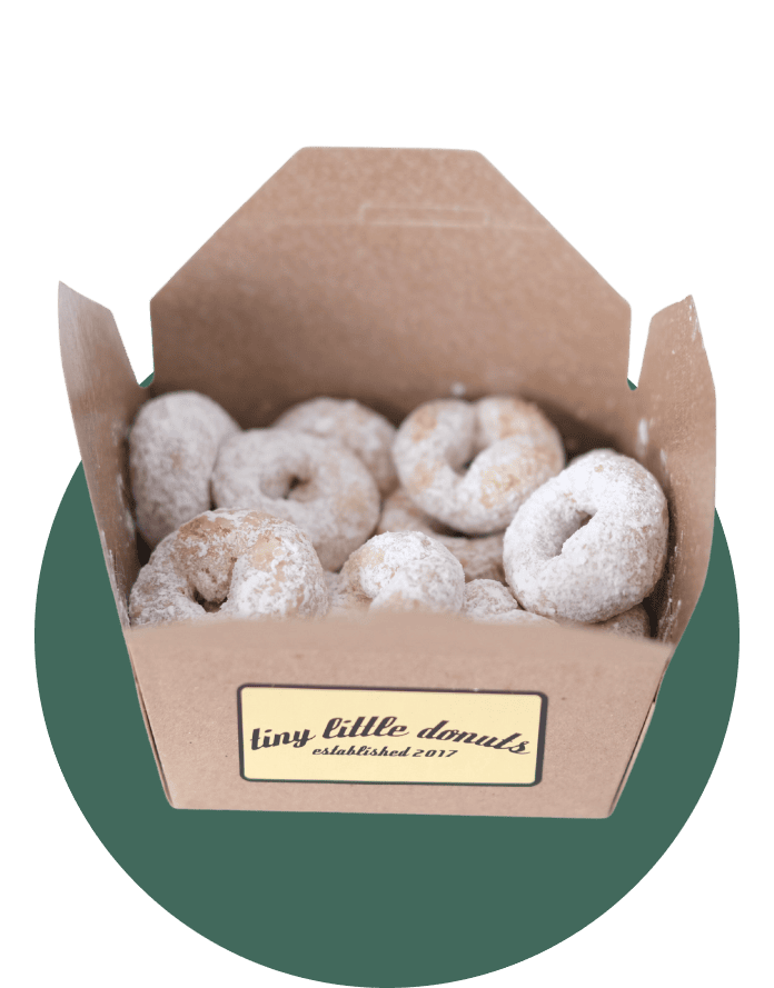 box of powdered sugar donuts