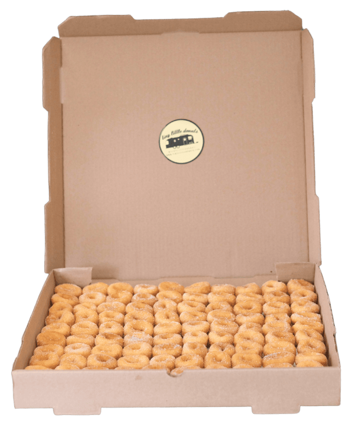 large box full of donuts from tiny little donuts